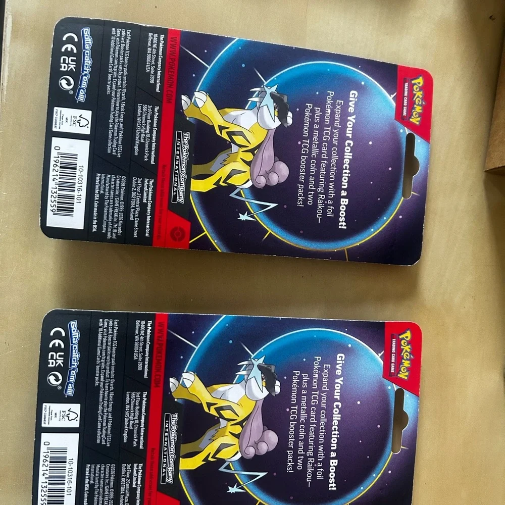 Lot of 10 Pokémon TCG booster double pack with two packs inside featuring Raikou